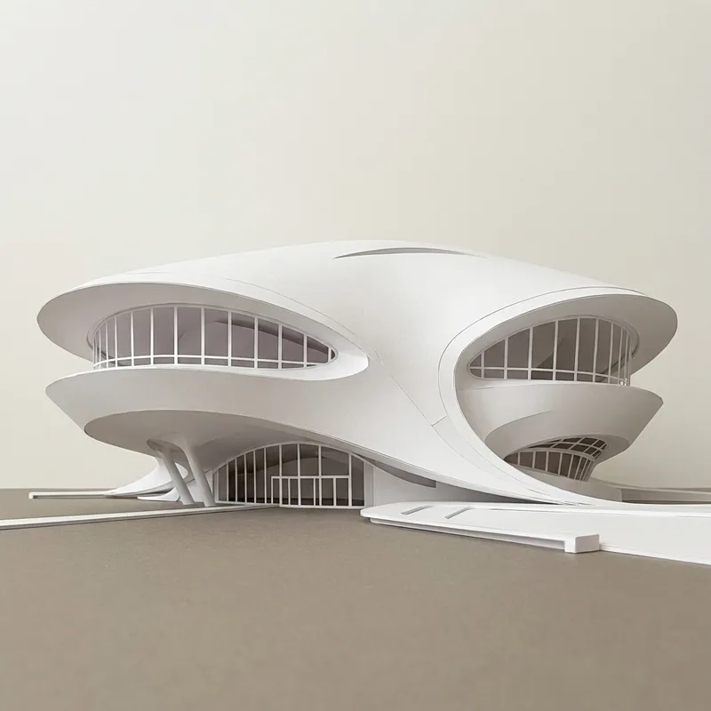 Render de maqueta blanca de un pabellón curvo.