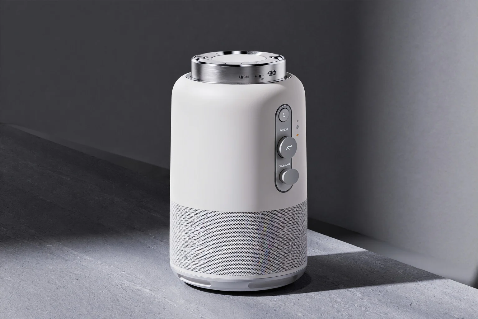 Exemple de design produit montrant une enceinte sans fil blanc mat sur une surface de pierre grise lisse